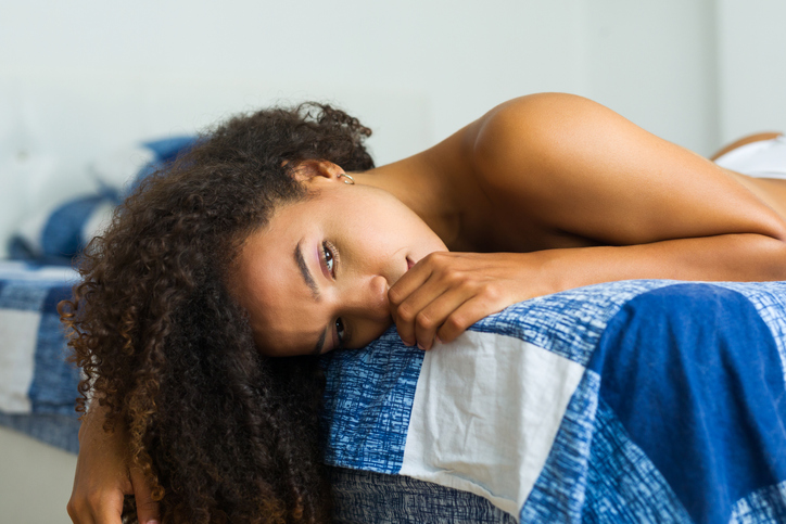 woman thinking about squirting