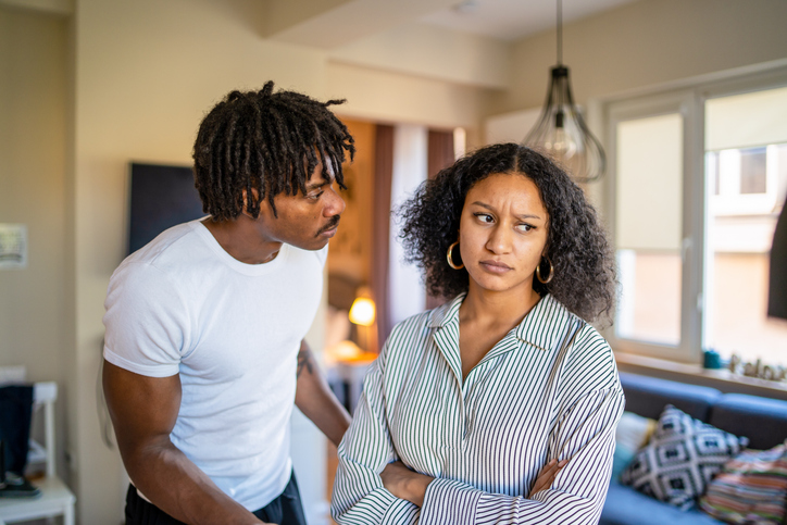 Frowning woman after argument with husband