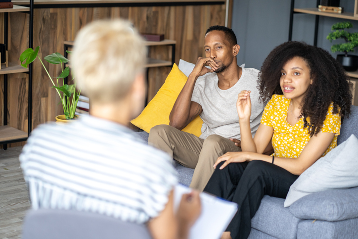 Young couple in a marriage counselling session after infidelity