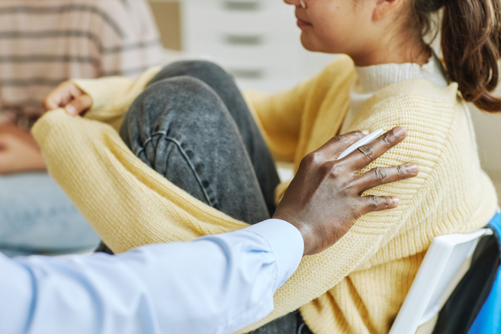 Therapist Helping Teens in Support Group