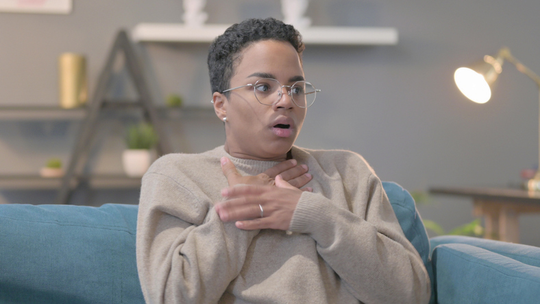 Portrait of African Woman Feeling Scared, Frightened during panic attacks
