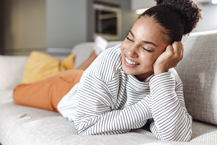 Young beautiful woman resting at home