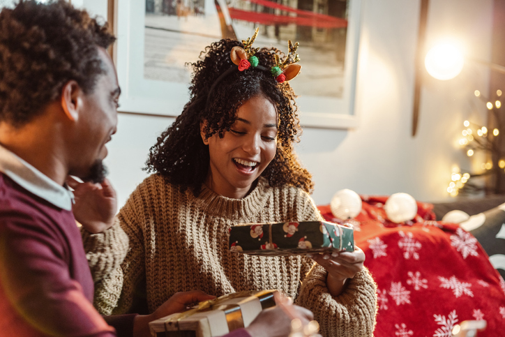 Christmas gift exchange at home opening unwanted gifts