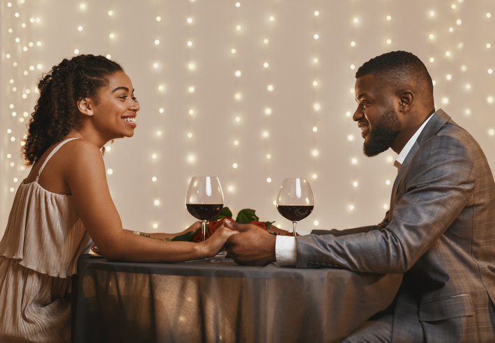 Romantic couple in love having date at restaurant woman is a mindful dater
