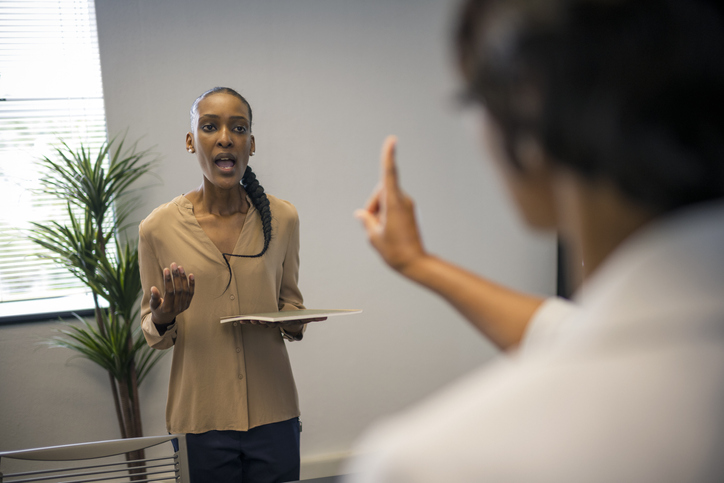woman learning How To Handle Someone Who Talks Over You