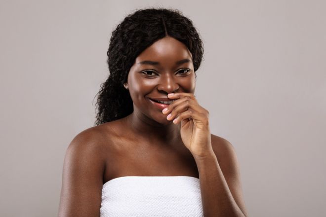 Beauty Treatments. Portrait Of Young Smiling African American Female With Flawless Skin