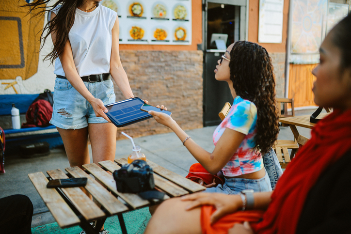 Group of friends in a cafe in Venice, California