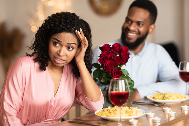 Black Woman On Unsuccessful First Date In Restaurant