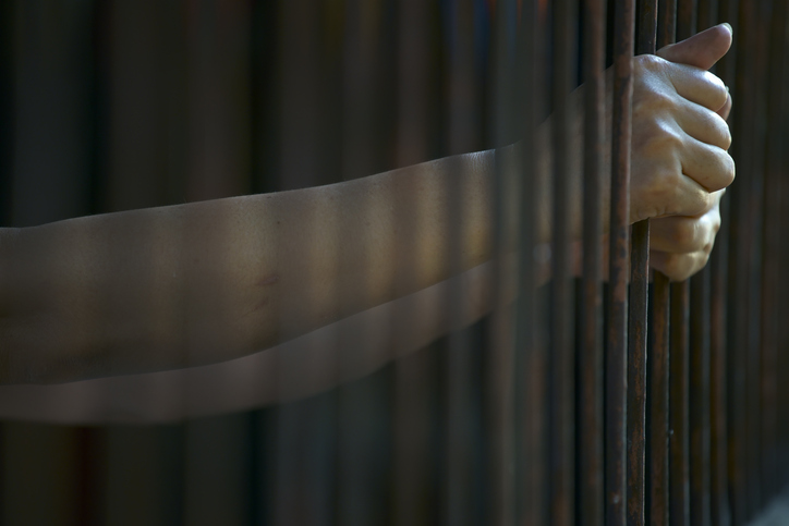 hands in jail