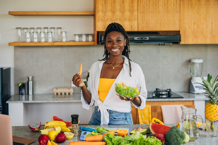 Woman eating a fresh salad