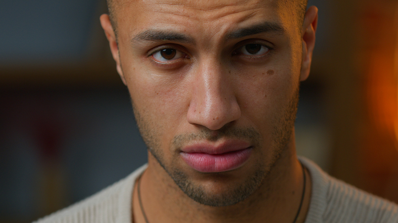 Portrait man African American adult guy serious angry pensive expression looking at camera Latino multiracial ethnicity male businessman with sad offended face emotion posing close-up headshot indoors