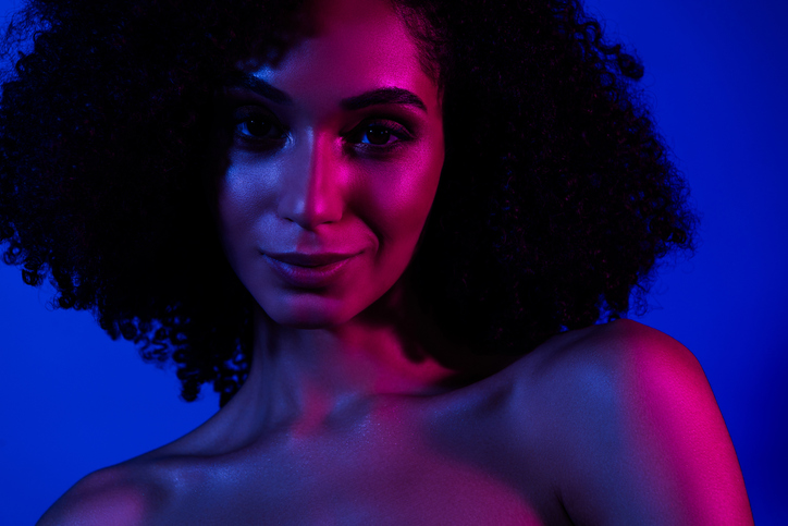 Portrait of girl lady look camera isolated neon multicolor background