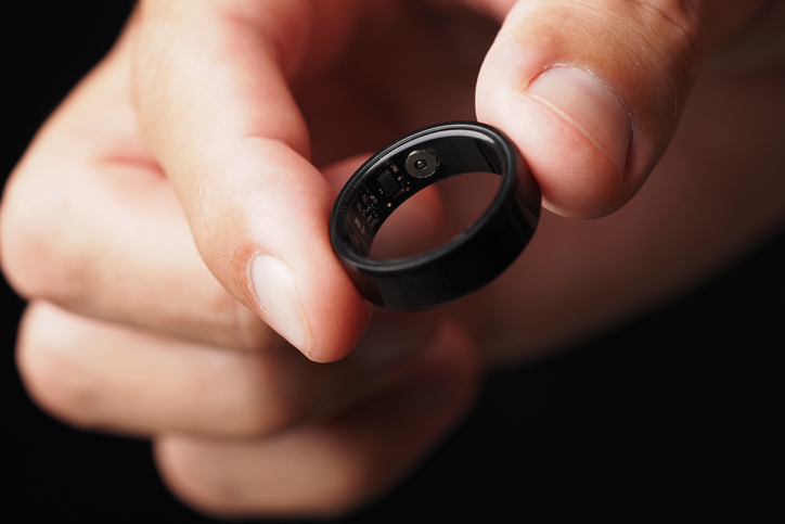 Hand Holding Smart Ring, Heart Rate, Blood Oxygen Tracker.
