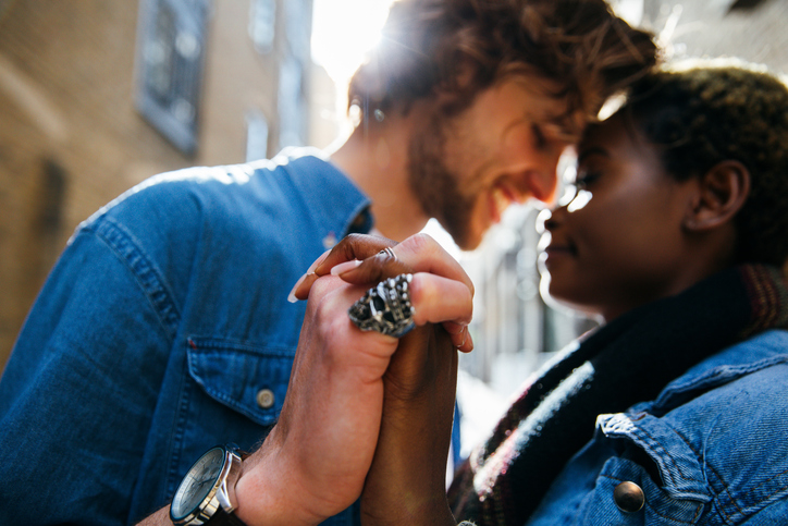 Lovely couple embracing in the streets
