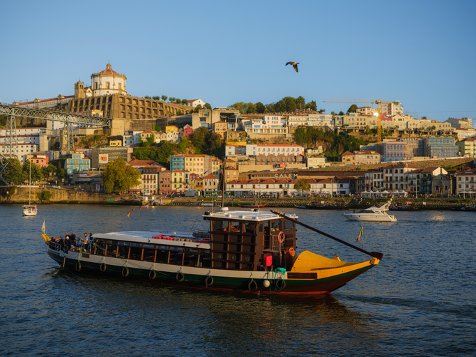 Ship on the background of Porto cityscape, Portugal